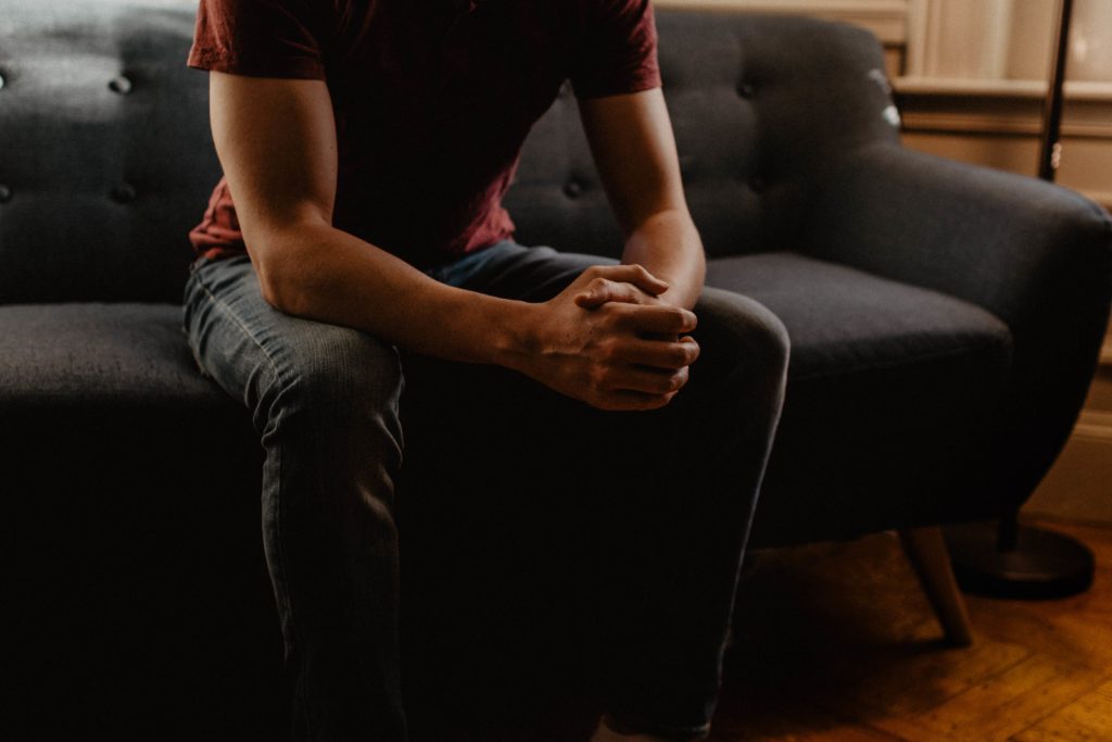 is hypnotherapy effective for anxiety man sitting on therapist sofa